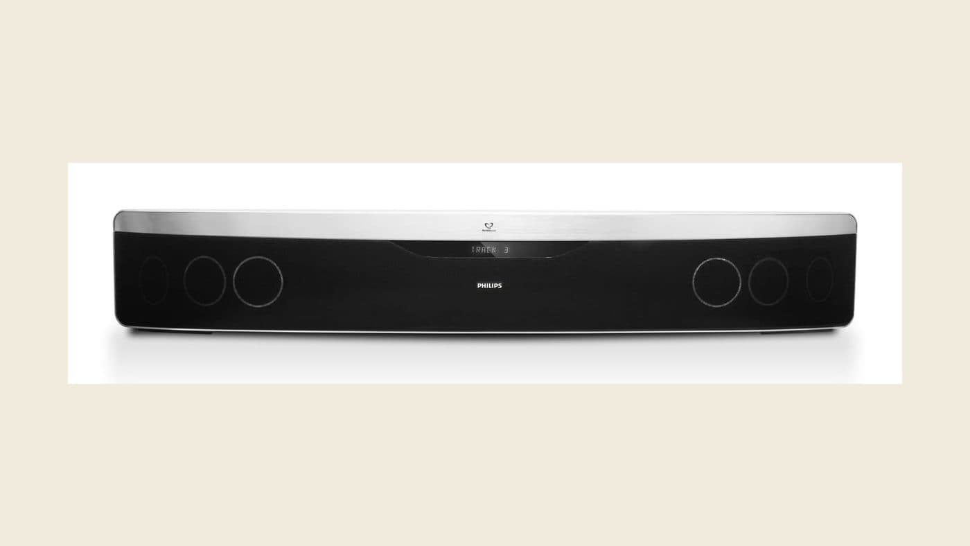 Soundbar below a wall-mounted television
