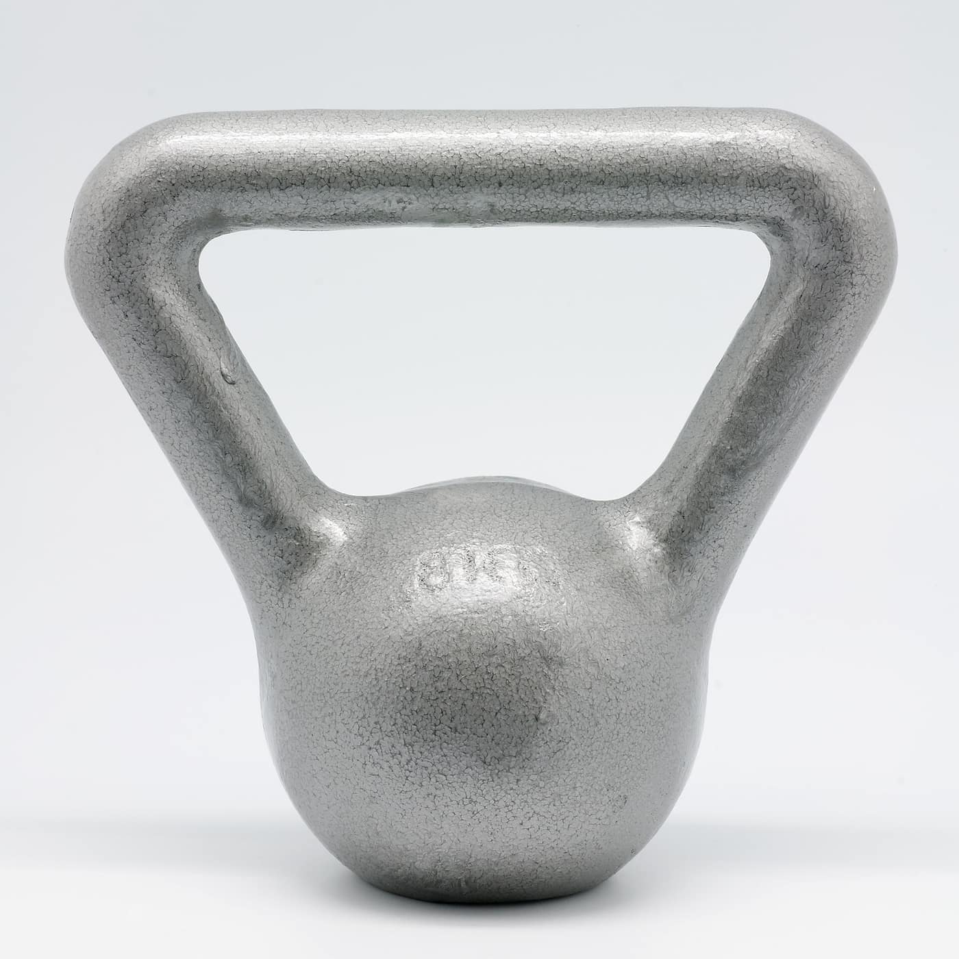 Cast iron kettlebell on a gym floor