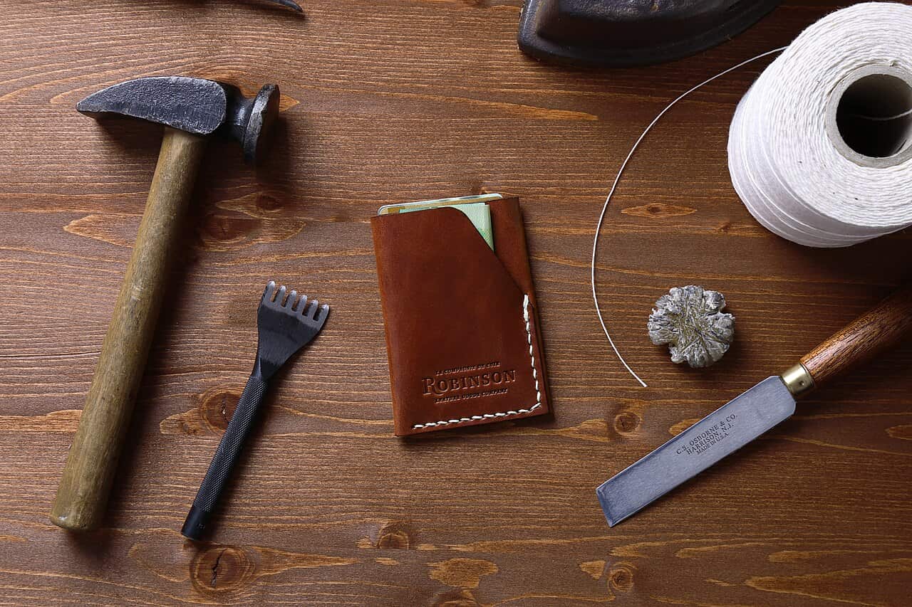A tidy desk with everyday gear arranged in warm natural daylight